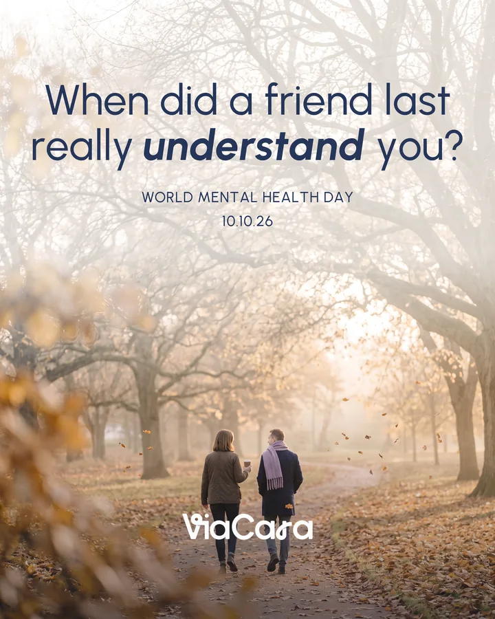 Two friends walk away along a misty autumn path. Navy text reads: When did a friend last really understand you?